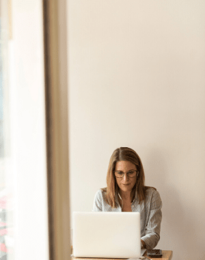 Woman on a laptop working at a desk