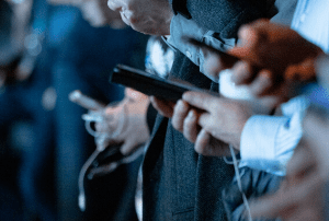 People in suits on mobile phones