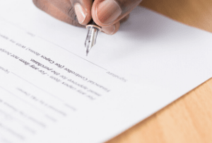 Man signing contract
