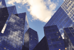 A picture of high sky buildings taken from the ground