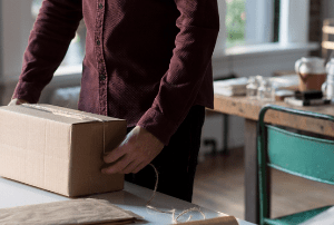 Man packing a box